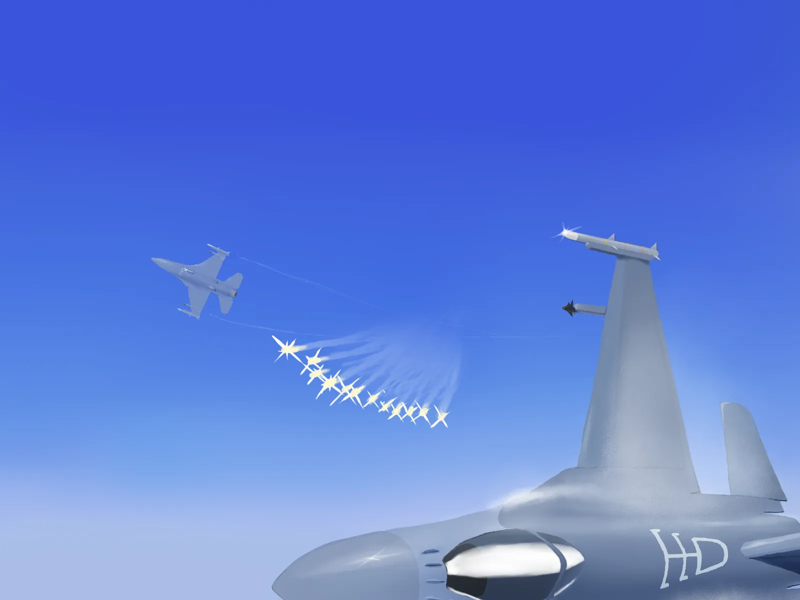 2機のF-16がフレアを放ちながら散開している。